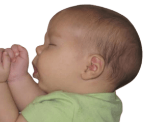 This image shows a baby with the neck and airway in neutral, natural babywearing positioning 